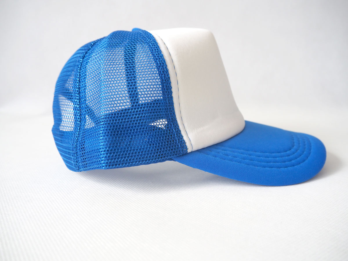 Cap with mesh back panels for sublimation