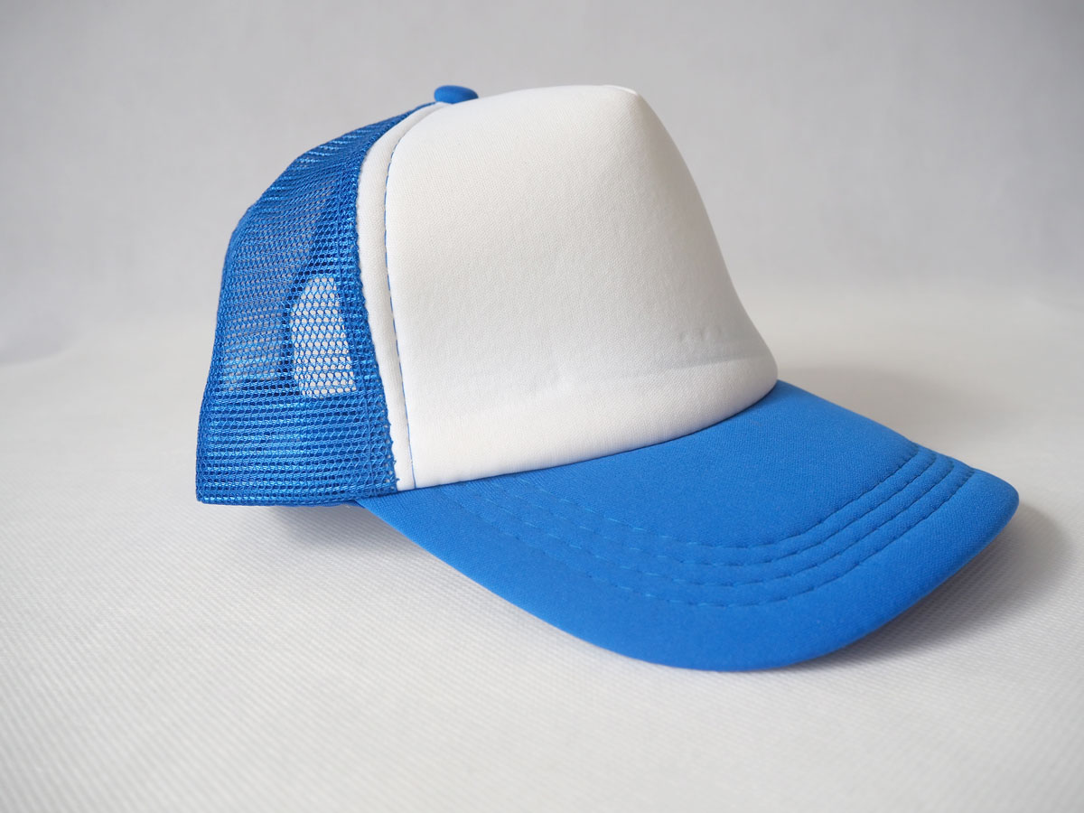 Cap with mesh back panels for sublimation