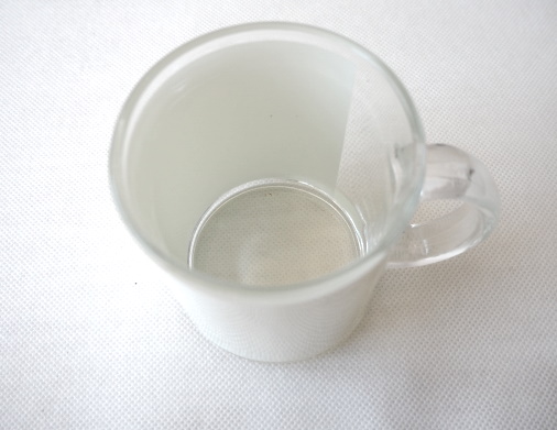 Transparent glass mug with white field for sublimation