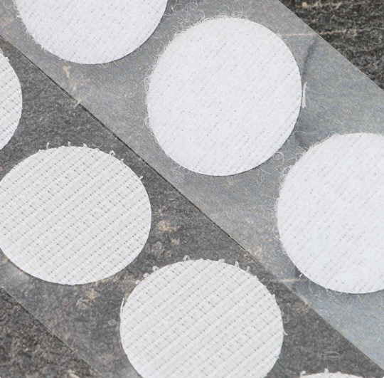 Self-adhesive velcros with a round shape