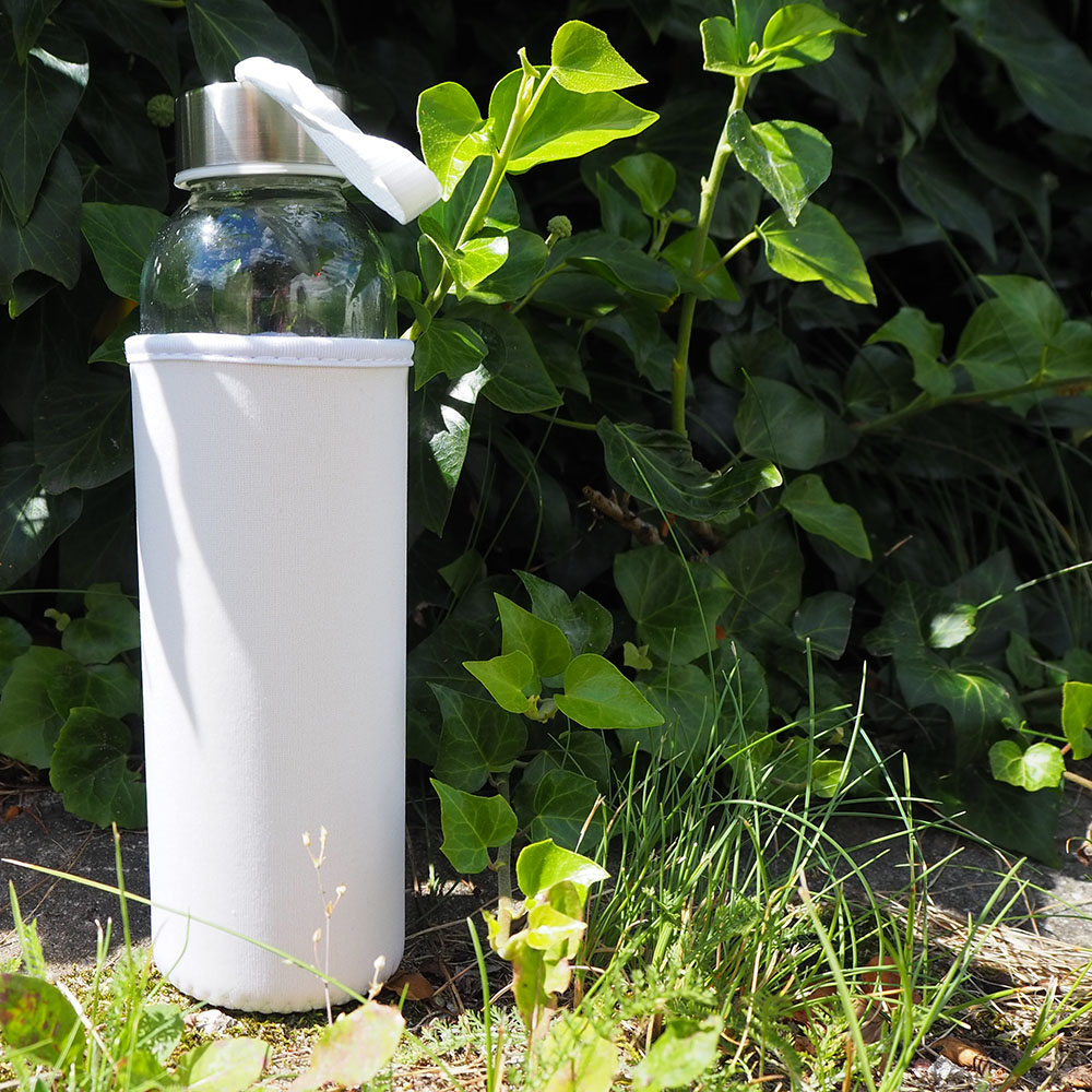 Glass bottle with a cover
