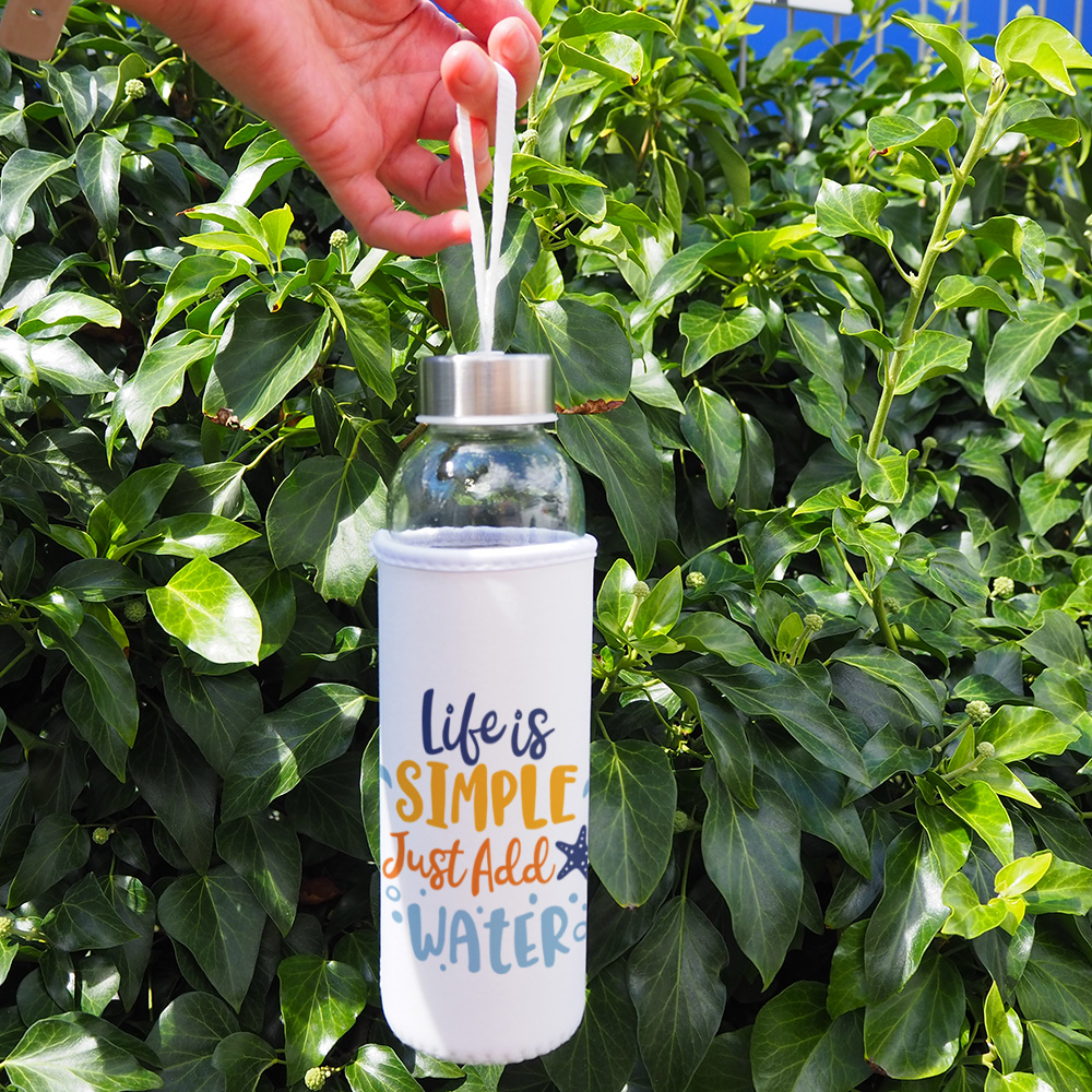 Glass bottle with a cover