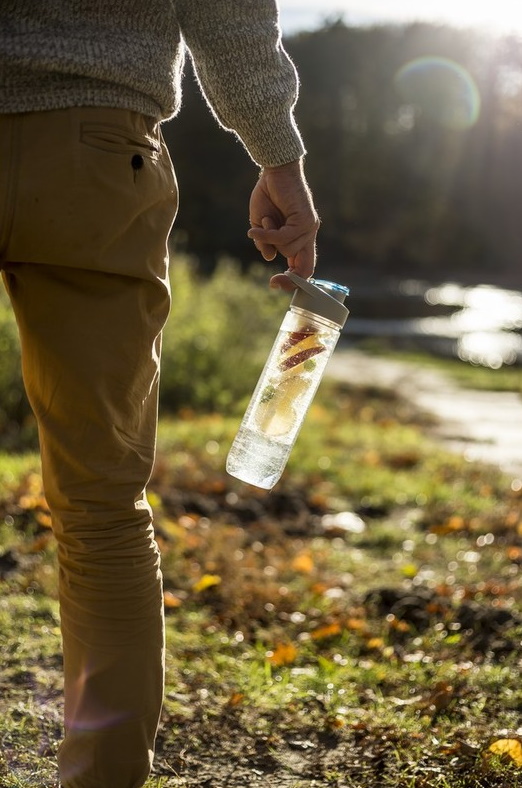 Bottle with insert for ice and fruit - gray-orange lid