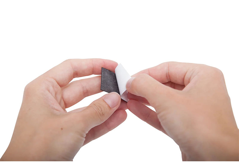 Self-adhesive magnetic tape