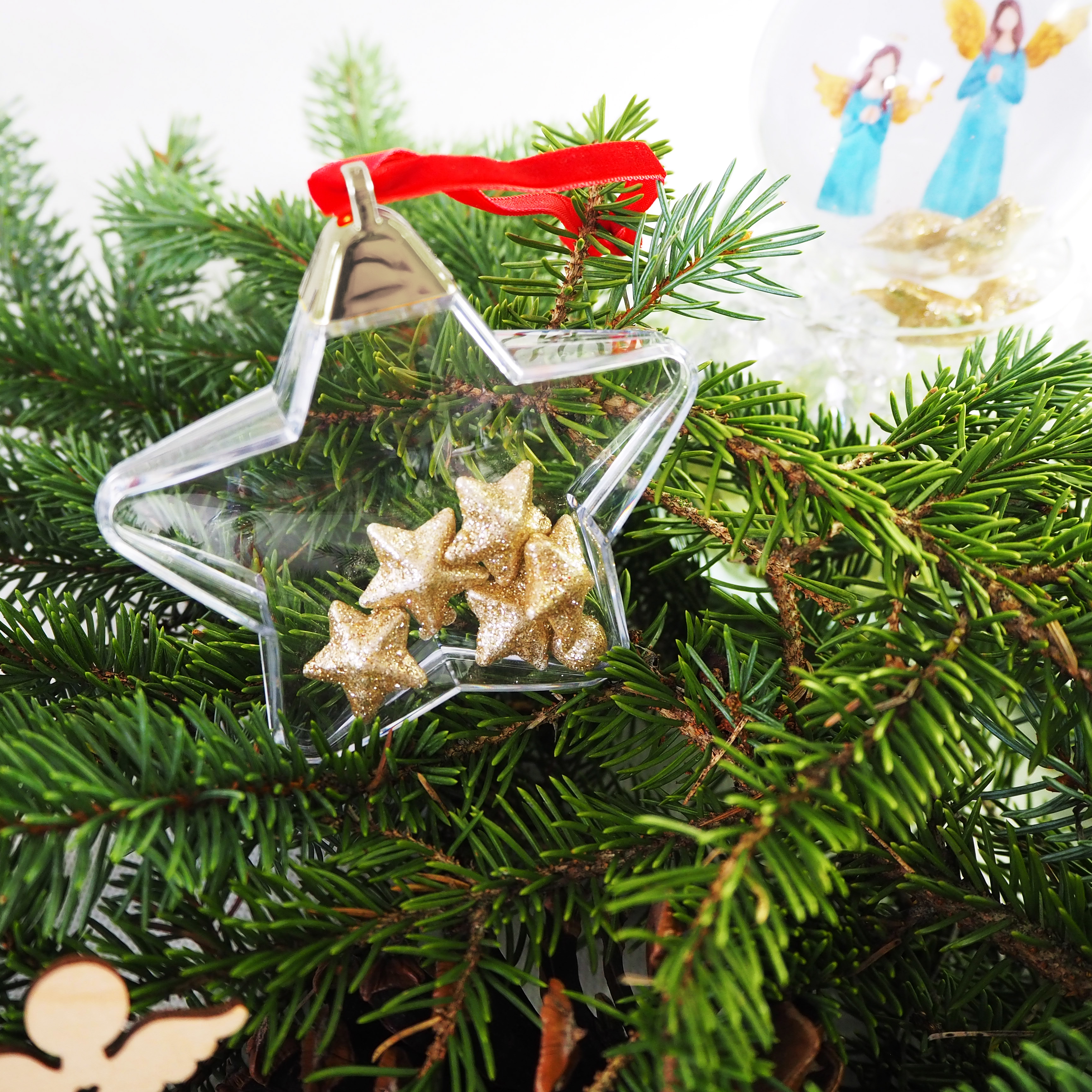Photo Christmas bauble with red ribbon and silver cap - star