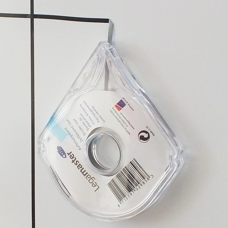 Self adhesive divider tape for planning boards